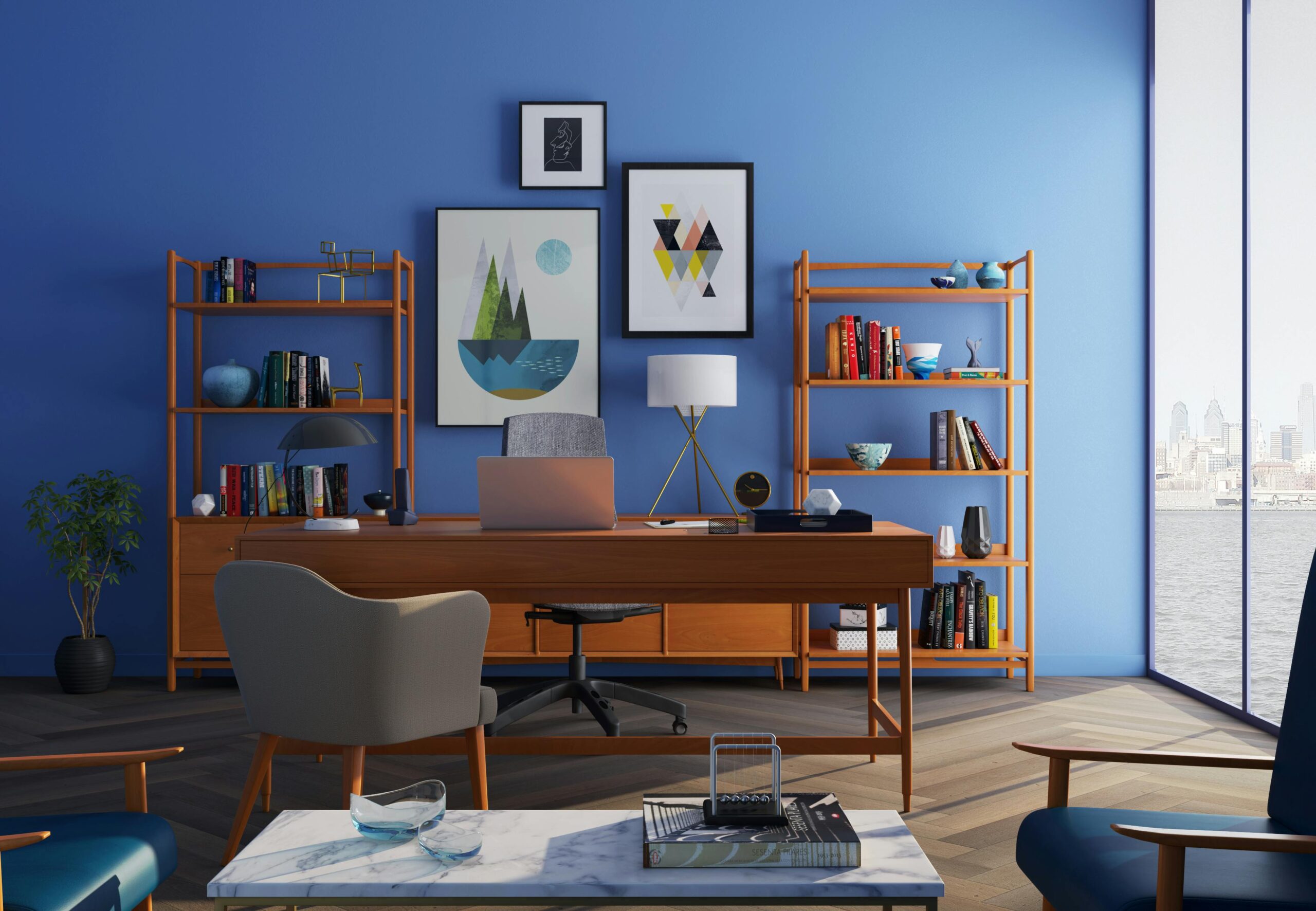 Elegantly decorated home office with modern furniture and a blue wall.